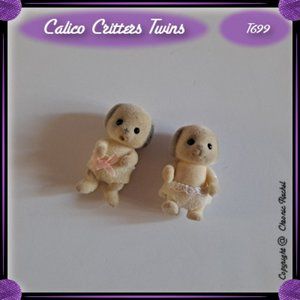 Ivory Dog Twin Babies